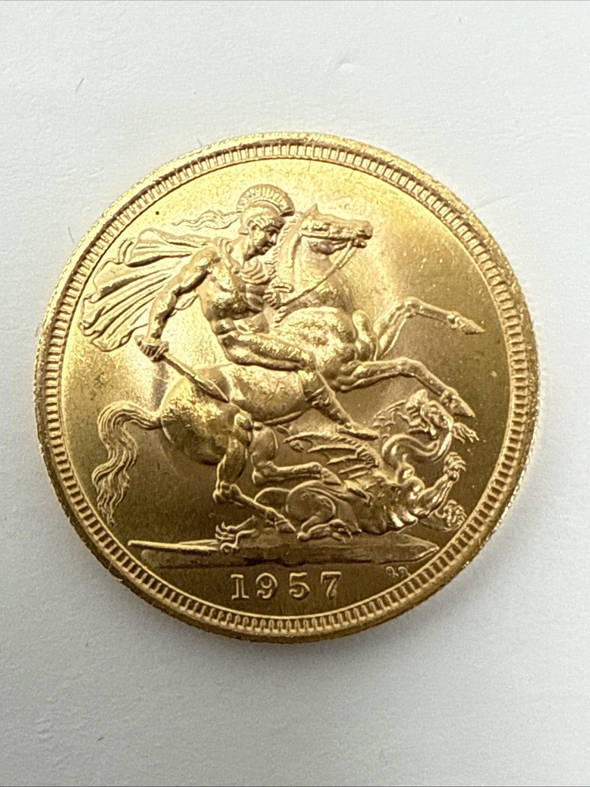 Exclusive Coins 1957 Queen Elizabeth II First Issue Full Gold Sovereign Nice Grade
