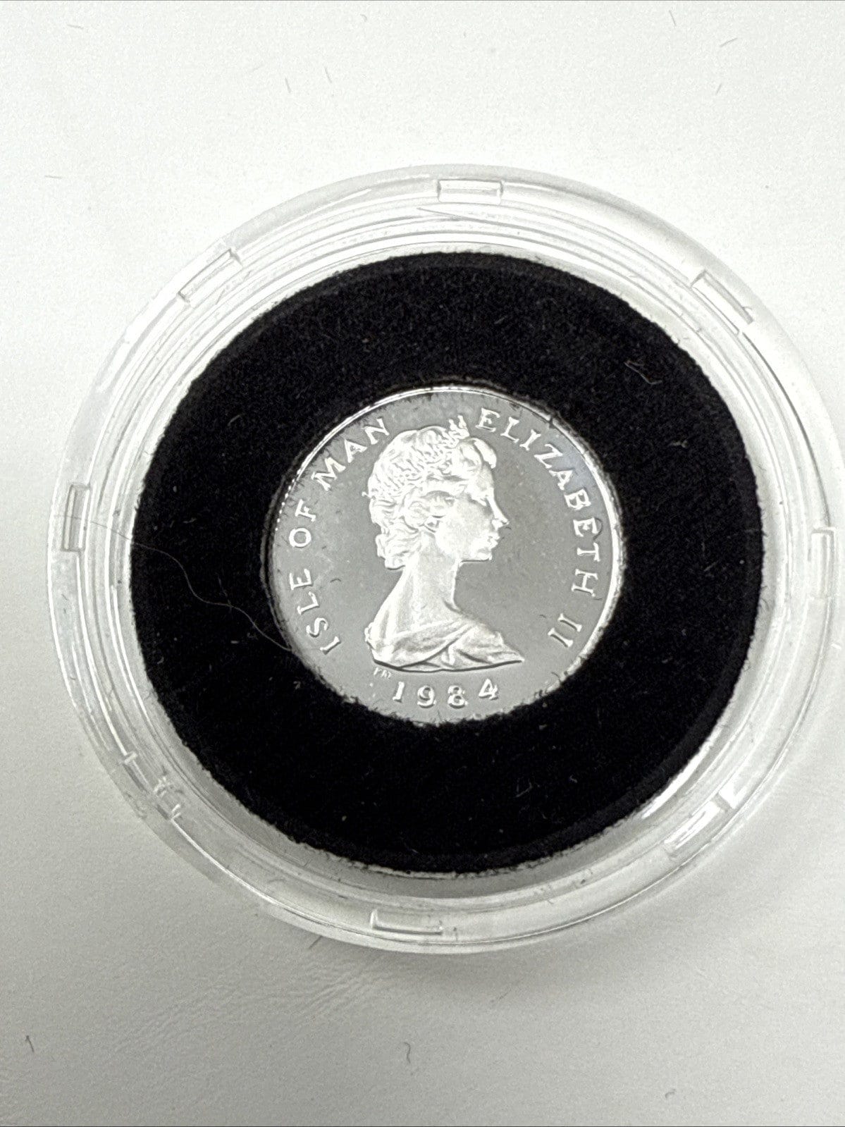 Exclusive Coins 1984 Isle Of Man 1/10 Fine Platinum Proof Coin As Struck