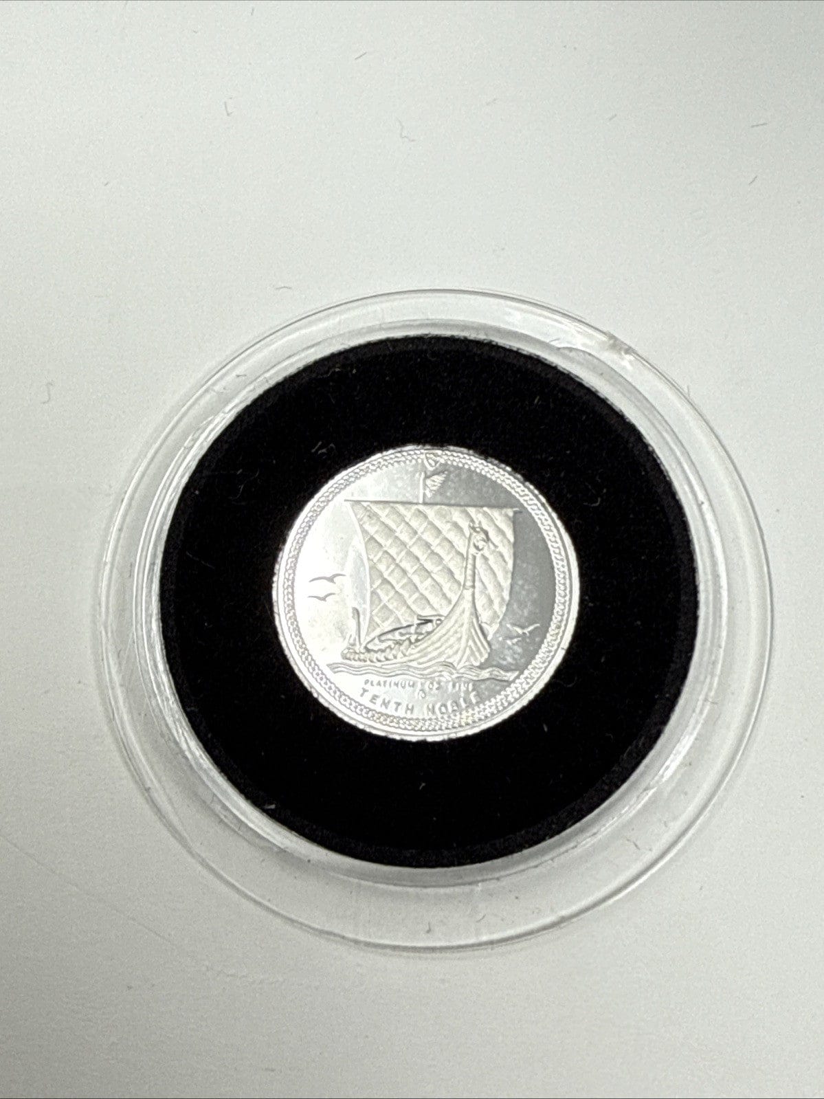 Exclusive Coins 1984 Isle Of Man 1/10 Fine Platinum Proof Coin As Struck
